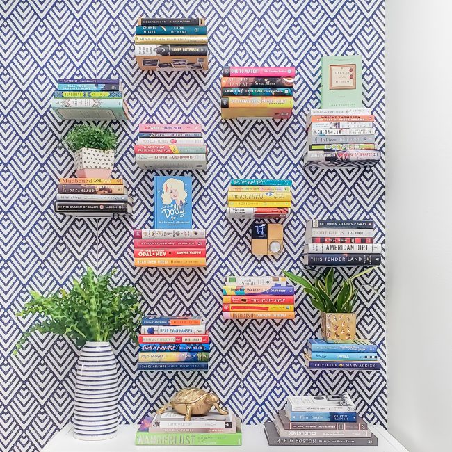 Wall of floating book stacks